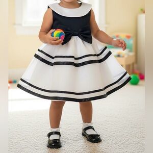 Elegant Black and White Dress with Bow